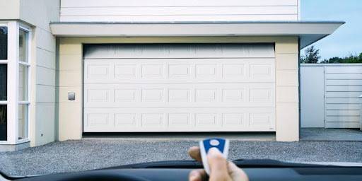 What causes an electric garage door to stop working?